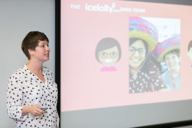 Photo of Gemma Elsworth presenting a slide on the 'Ice lolly data team'